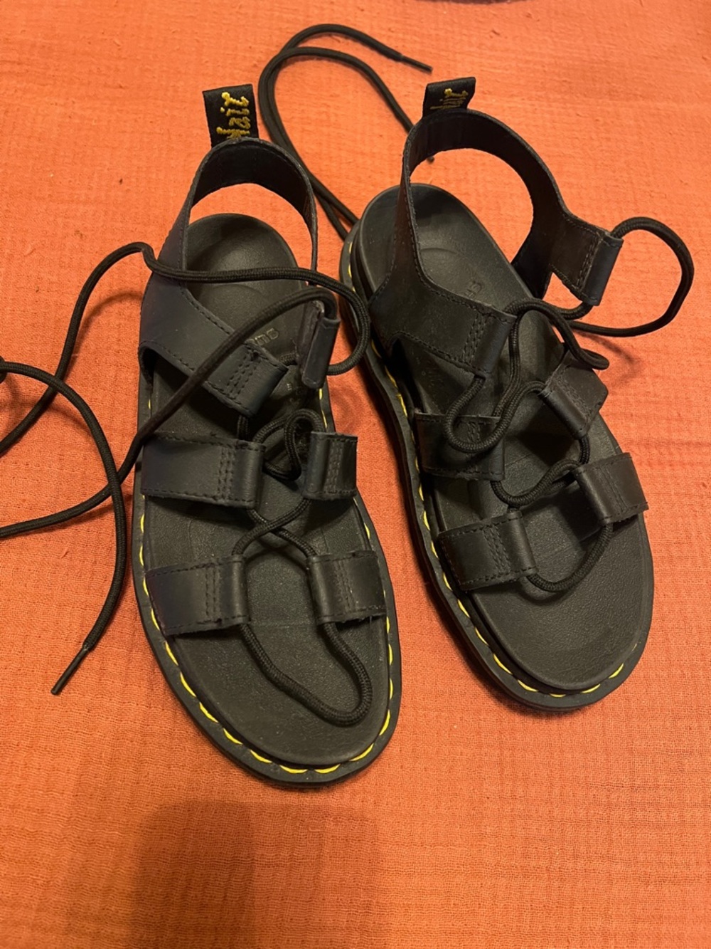 Dr. Martens Black Leather Lace-Up Sandals with Yellow Stitching Accents